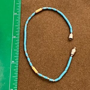 Simple turquoise, silver, and tan beaded bracelet